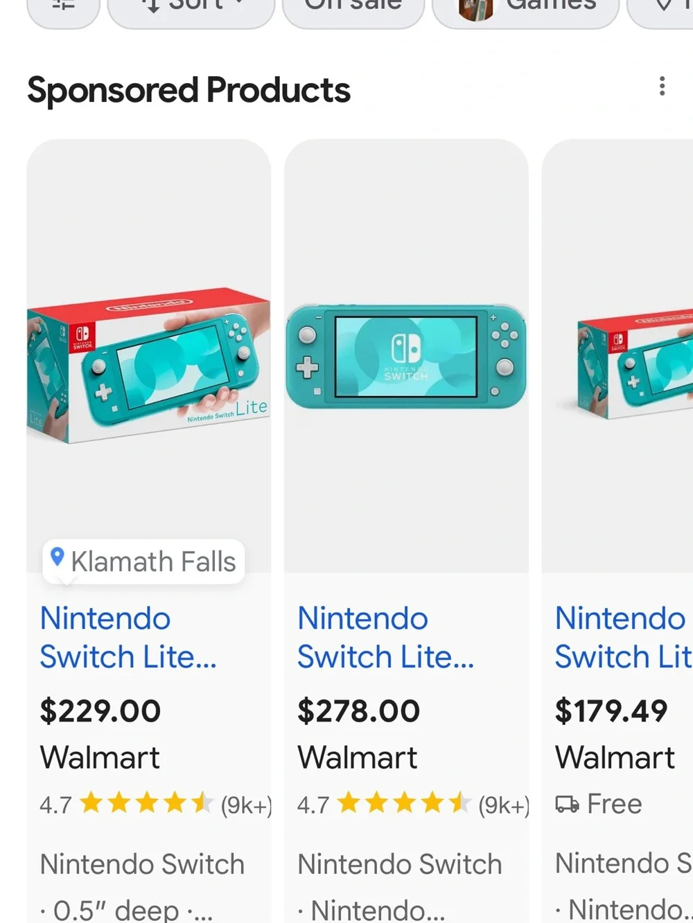 Nintendo Switch Lite Turquoise Handheld Console with Splatoon 2 and Accessories